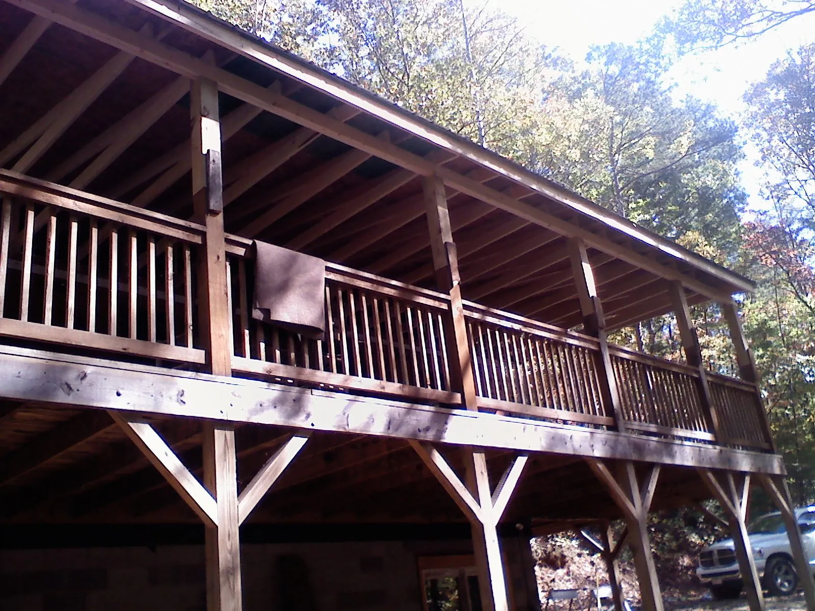 Timber framing under a new elevated porch and deck — Roof Leak Repair in Pleasant Garden by Roofing Brothers